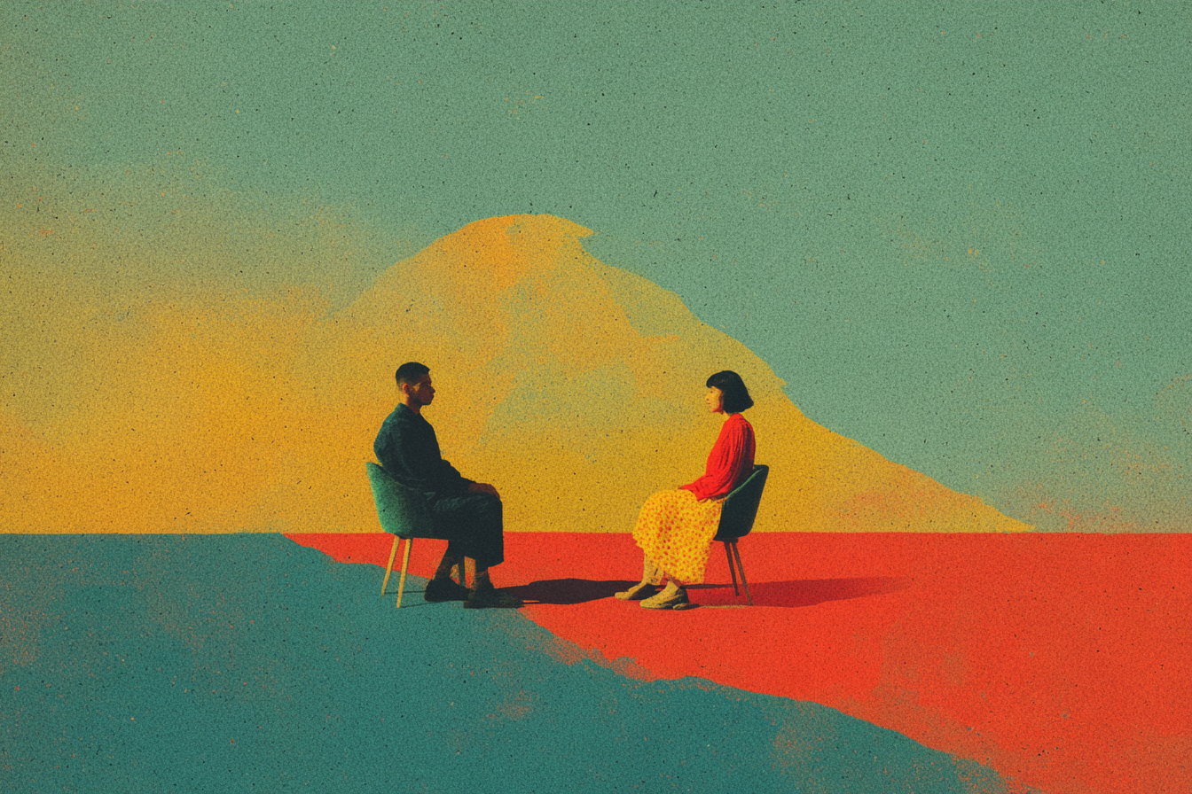 Two people sitting together in conversation